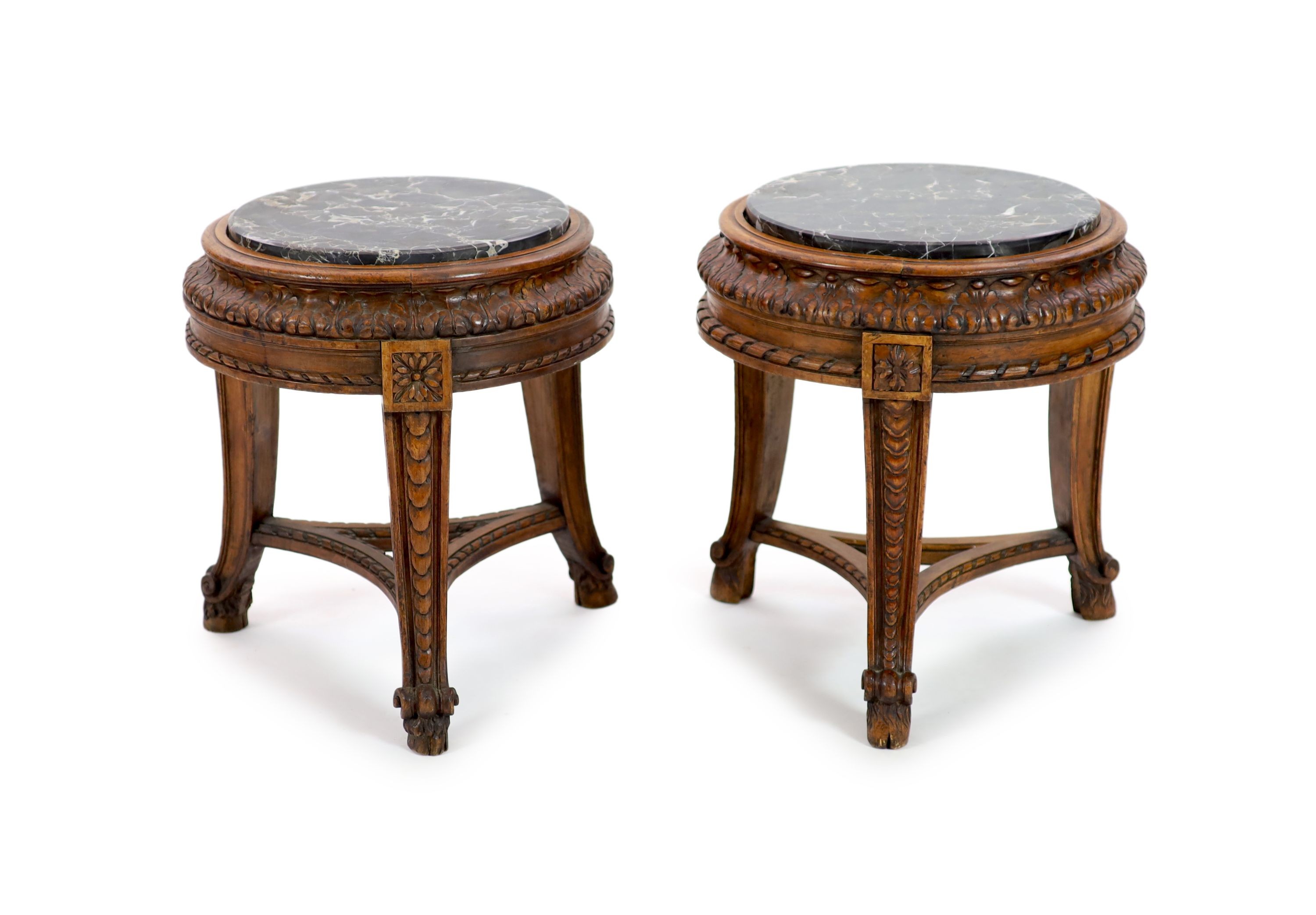 A pair of Italian circular carved walnut marble top vase stands, diameter 40cm, height 44cm